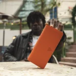 Leather Phone Wallet — Orange, Guti, 2028 — product view 1