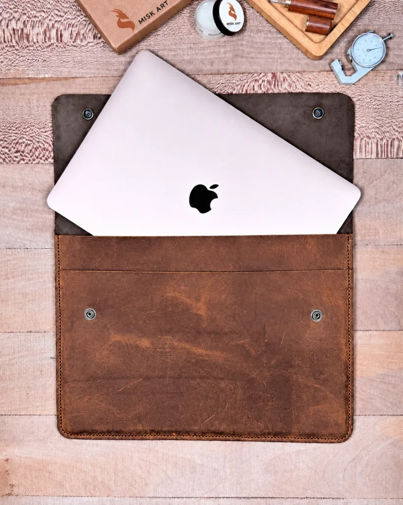 MISK ART brown leather MacBook Air sleeve — open sleeve with laptop