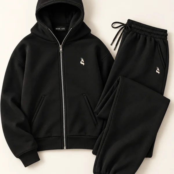 MISK ART Premium Zip-Up Hoodie & Jogger Set – Black Front, gazelle branding on an ivory studio background