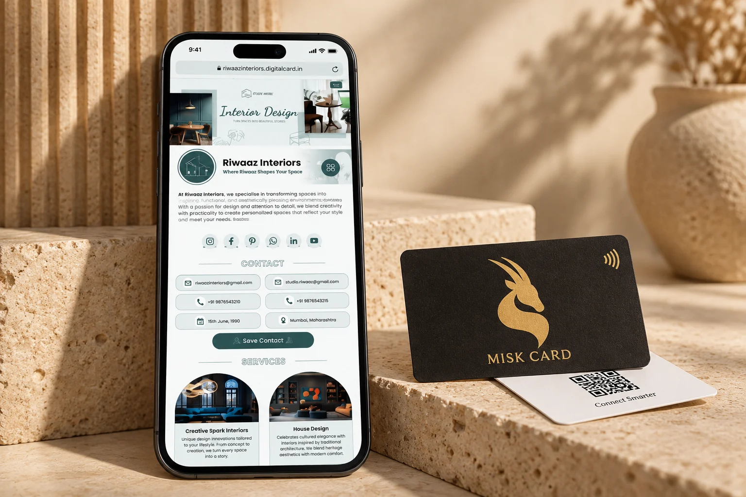 Gold gazelle MISK CARD beside a smartphone displaying a detailed teal interior design digital business card theme